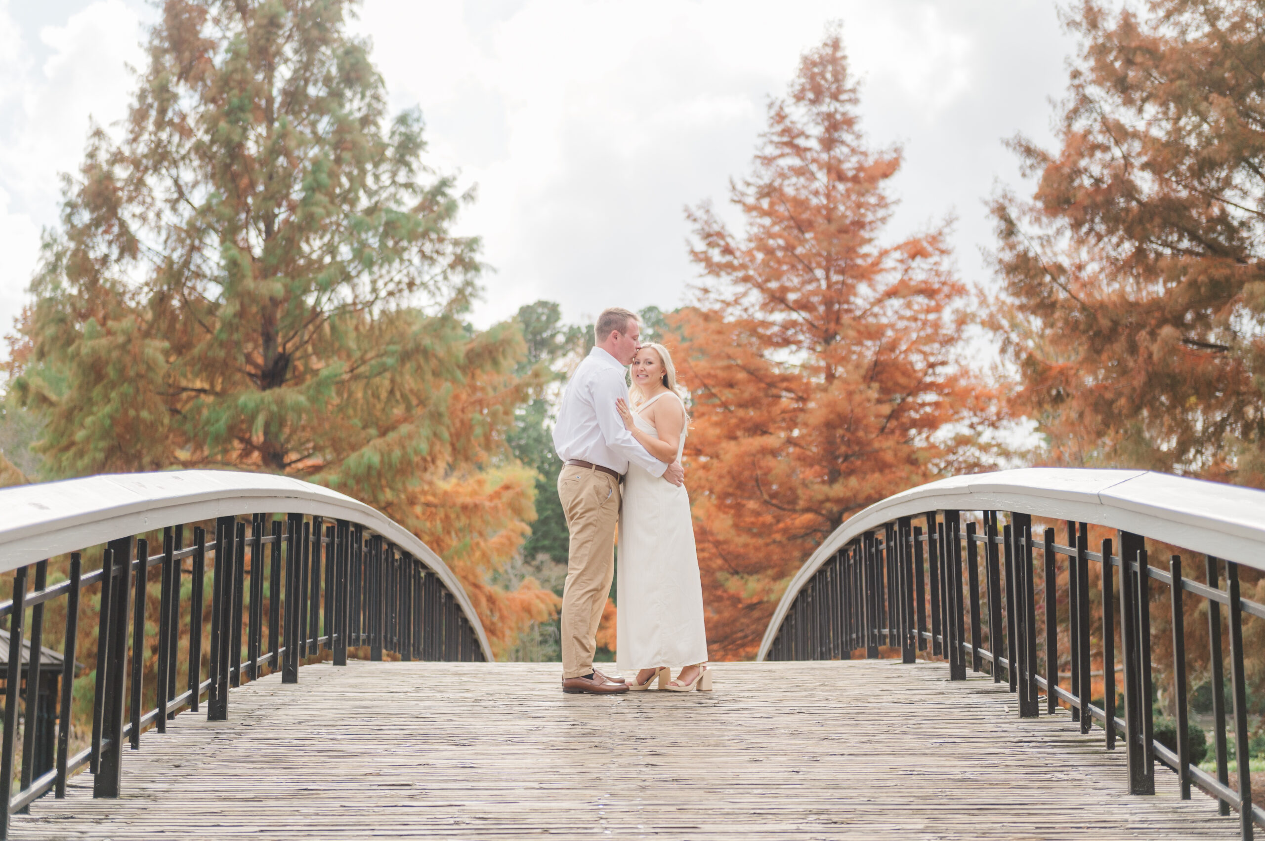 Fall foliage engagement photos in Raleigh NC at Pullen Park